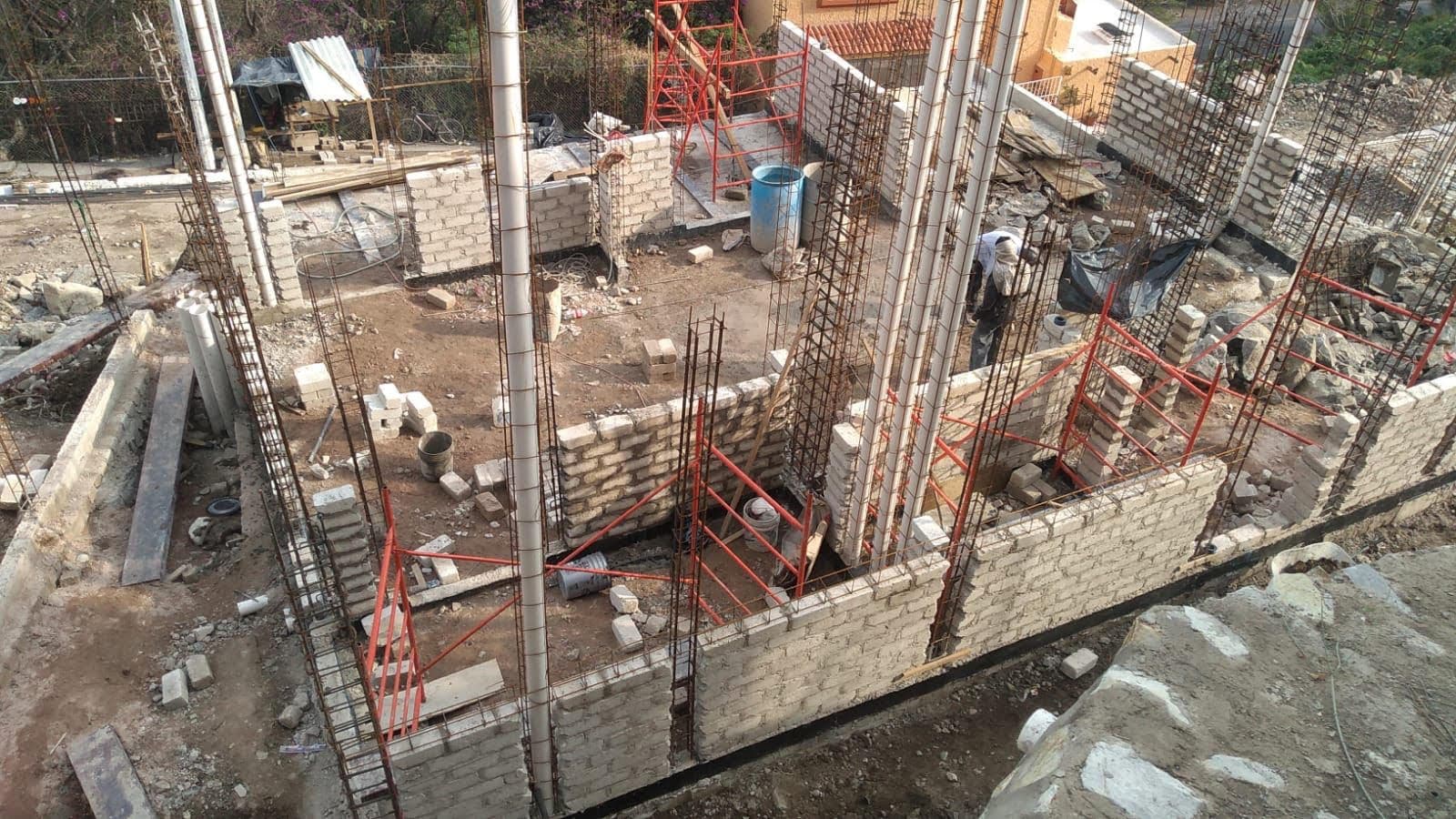 A home under construction near Lake Chapala, rebar columns and block walls going up on the jobsite